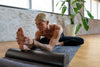 UTKATAMAT yoga mat showcased by Diane in a UTKATA CORE removed stretch position, highlighting strength and flexibility